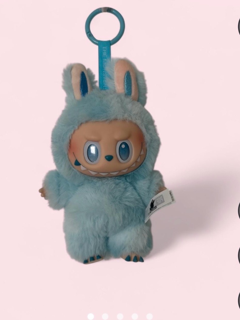 The monsters: big into energy AUTHENTIC labubu in color ‘Hope’.